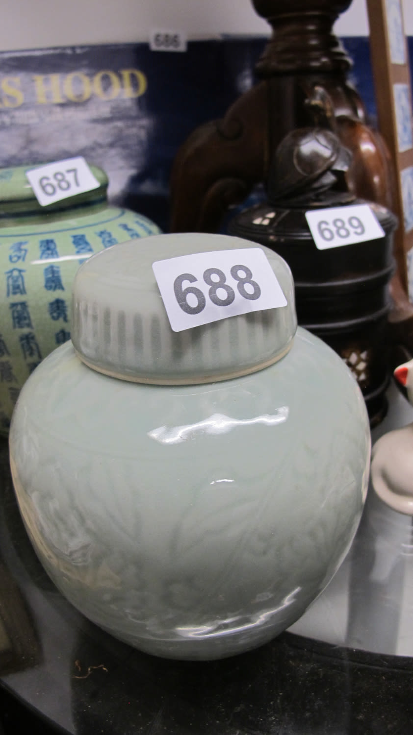 Lot 688: Antique celadon ginger jar, 4 character mark to...