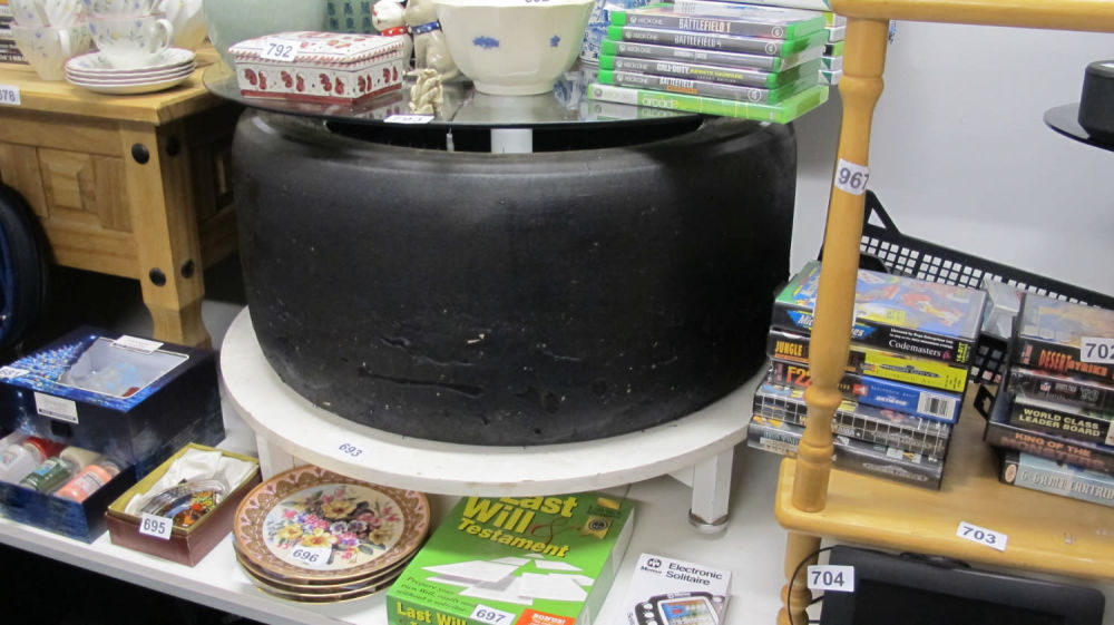 Lot 693: Coffee table made from a Formula 1 race...