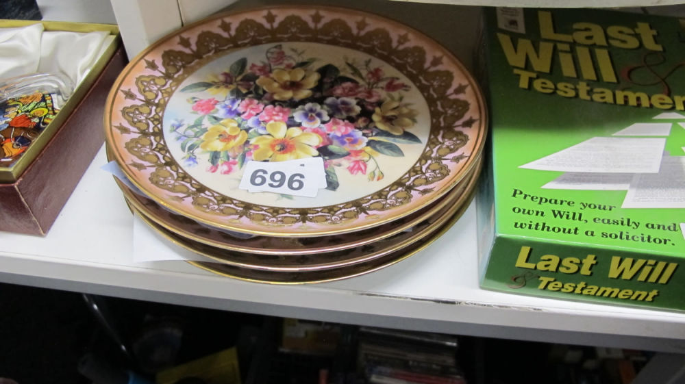 Lot 696: 4 hand painted floral plates