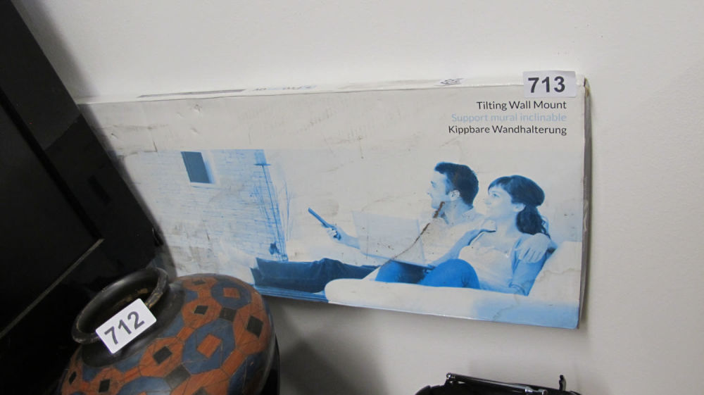 Lot 713: Tilting TV wall mount