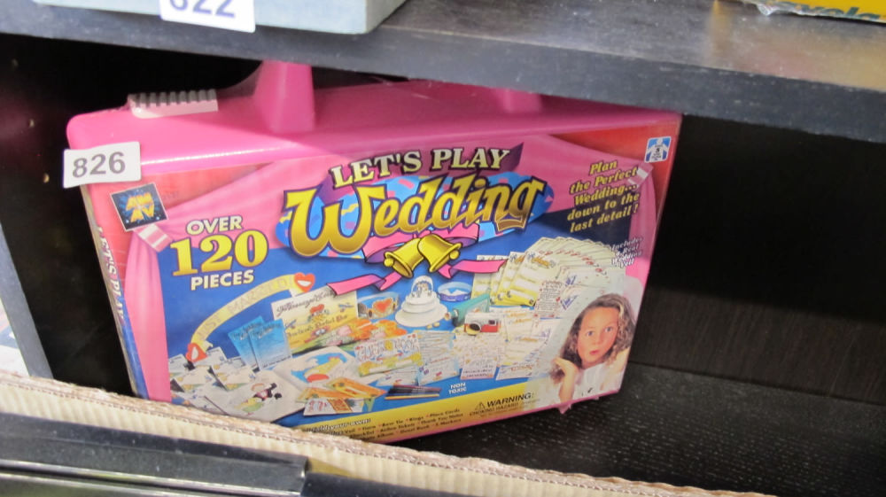 Lot 826: Brand new old stock Lets Play Wedding