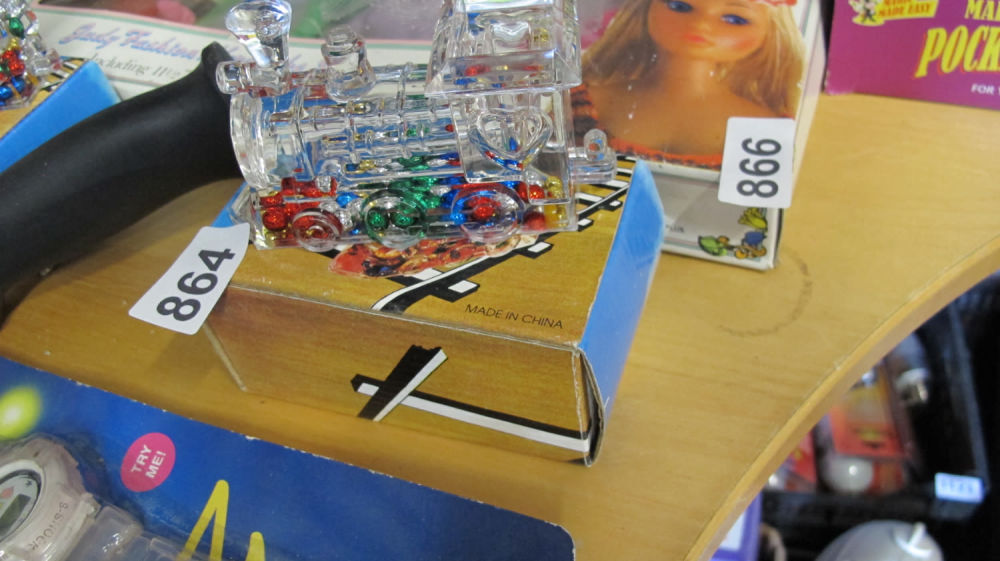 Lot 864: Brand new old stock train paperweight