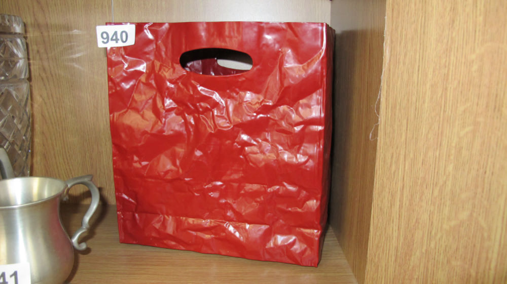 Lot 940: hard plastic bag