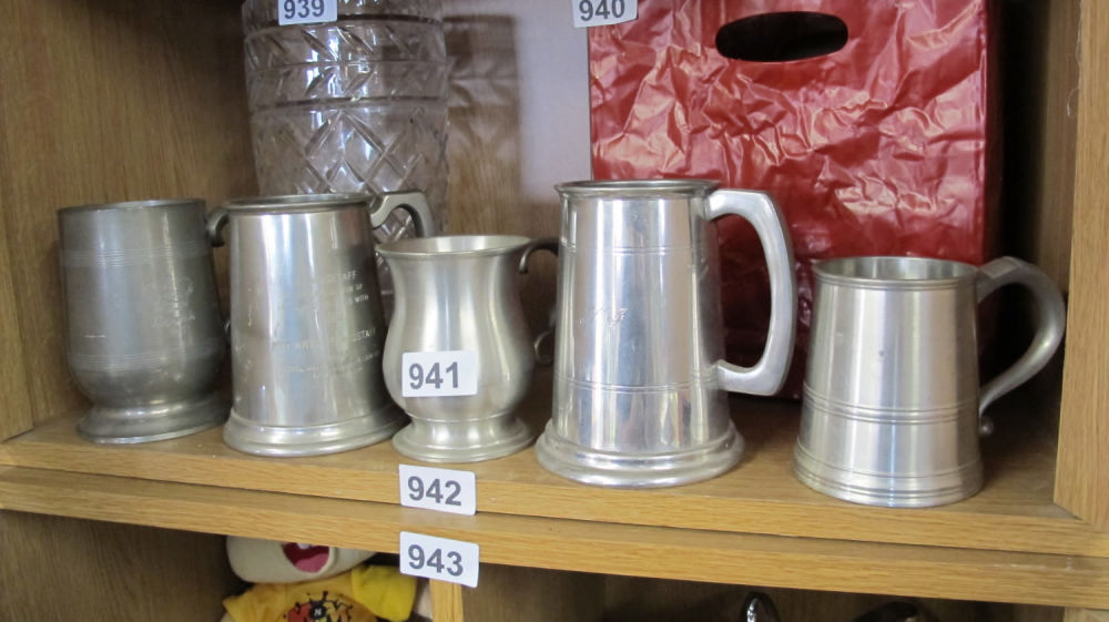 Lot 941: A selection of metal tankards