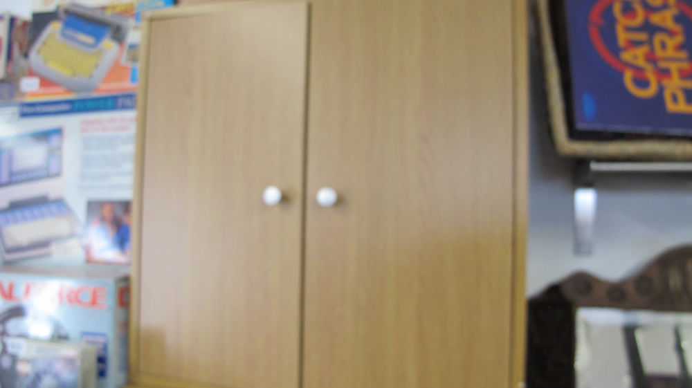 Lot 943:  Storage cupboard