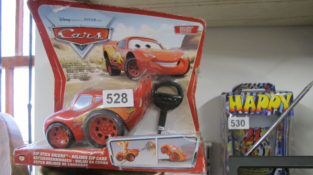 Lot 528: Cars Rip stick racer