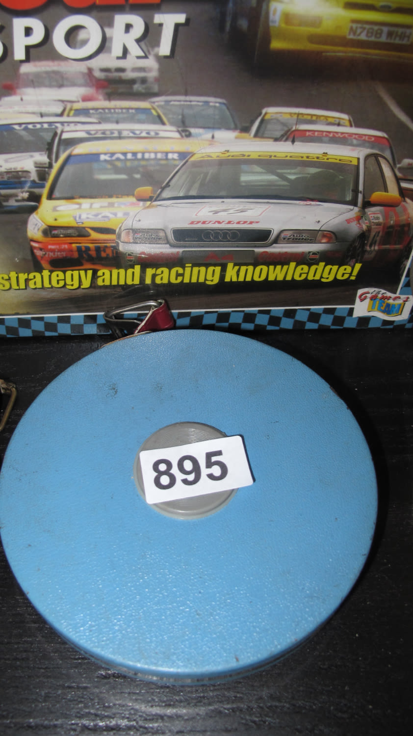 Lot 895: Vintage tape measure