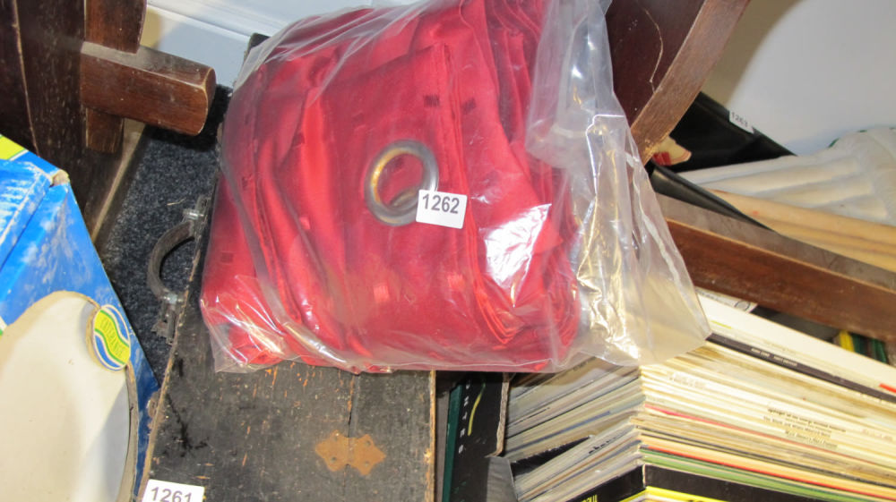 Lot 1262: Ring-topped red curtains