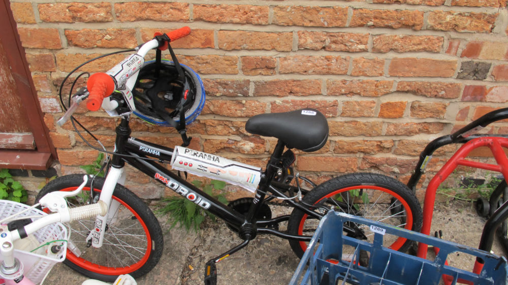Lot 1288: Kiddies BMX bike and helmet