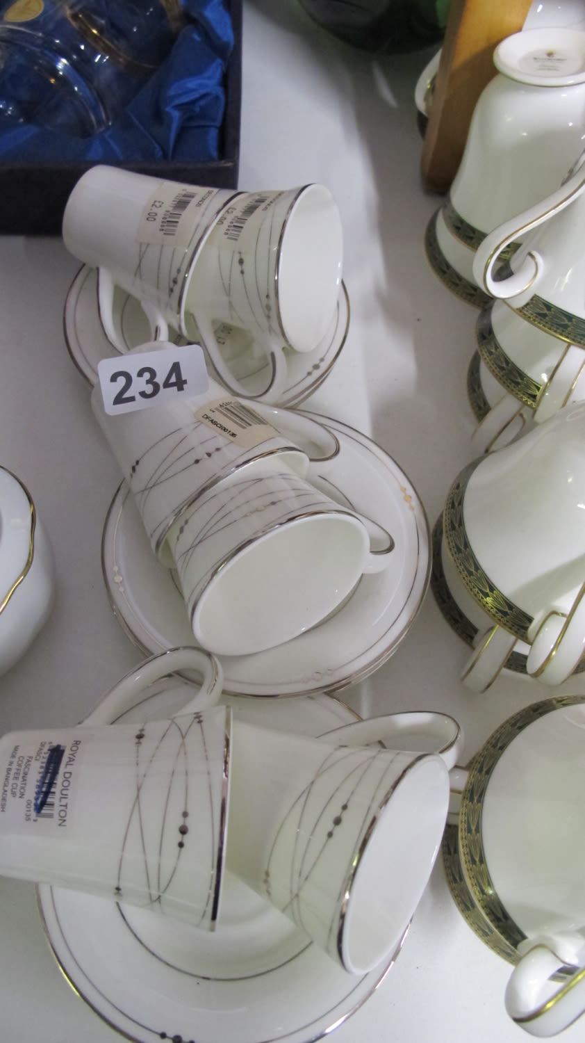 Lot 234: Royal Doulton cups and saucers