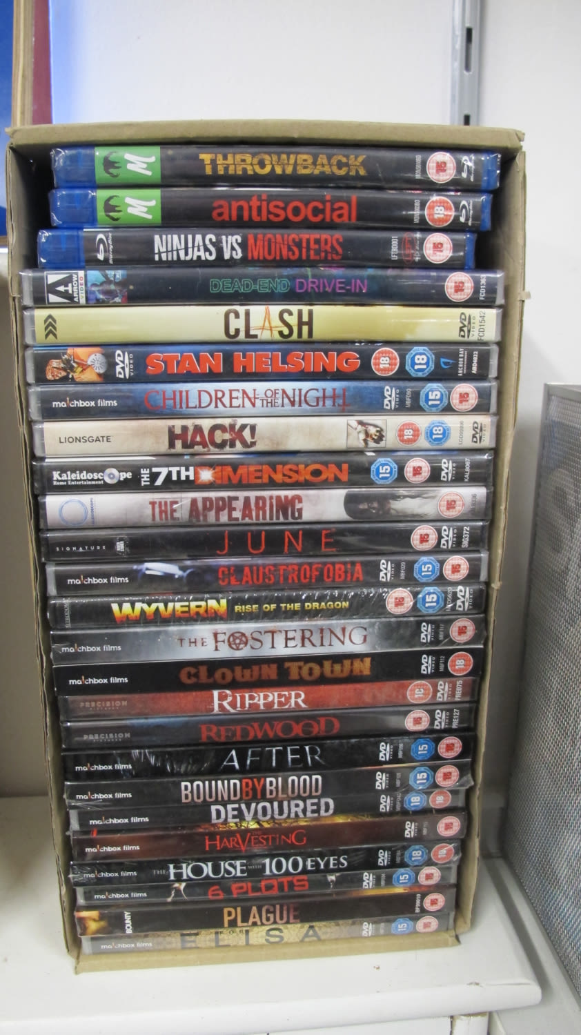 Lot 373: Box of new DVDs