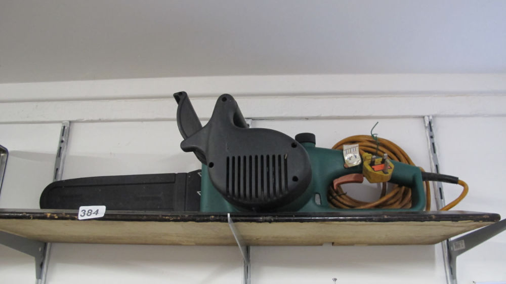 Lot 384: Electric chain saw 