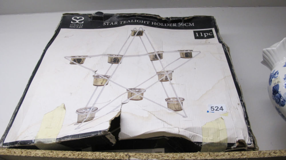 Lot 524: Star tealight holder