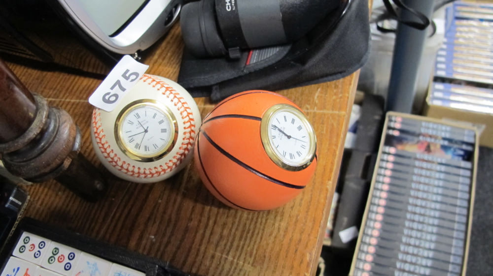 Lot 675: 2 novelty ball clocks