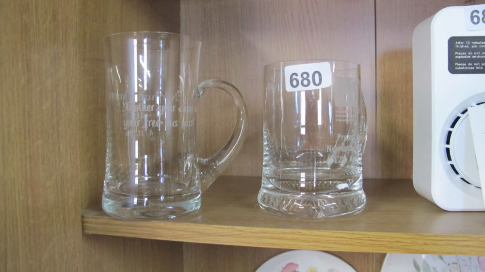 Lot 680: 2 engraved tankards
