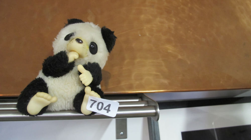 Lot 704: Little cute panda