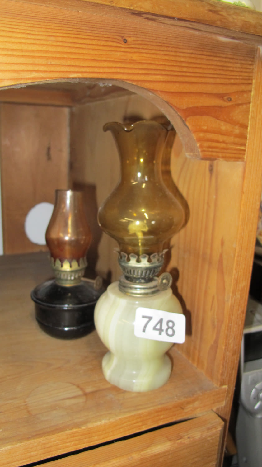 Lot 748: 2 small oil lamps