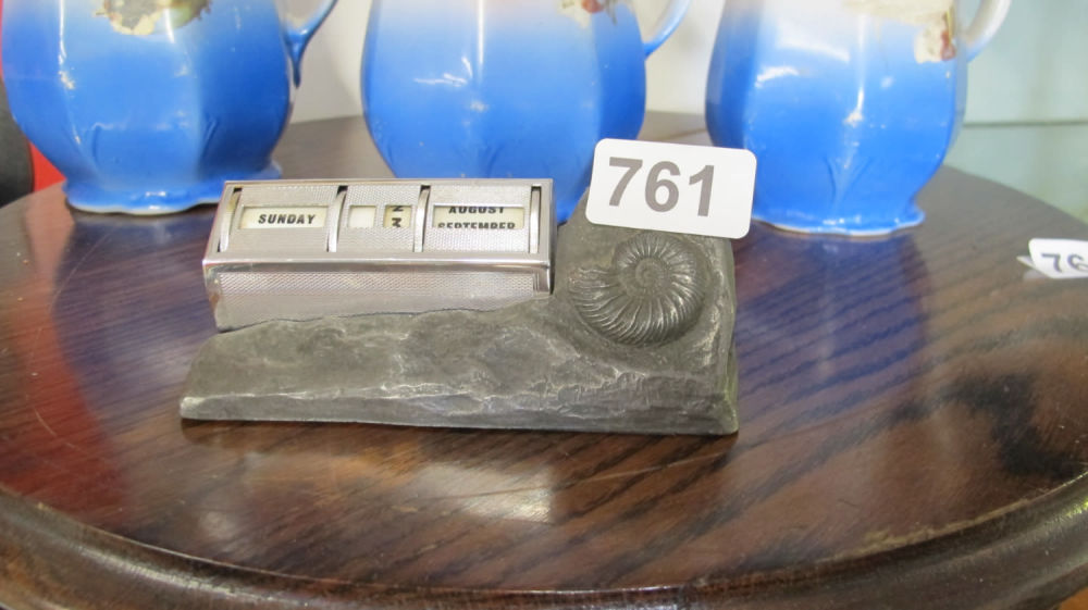 Lot 761: Ammonite perpetual desk calendar