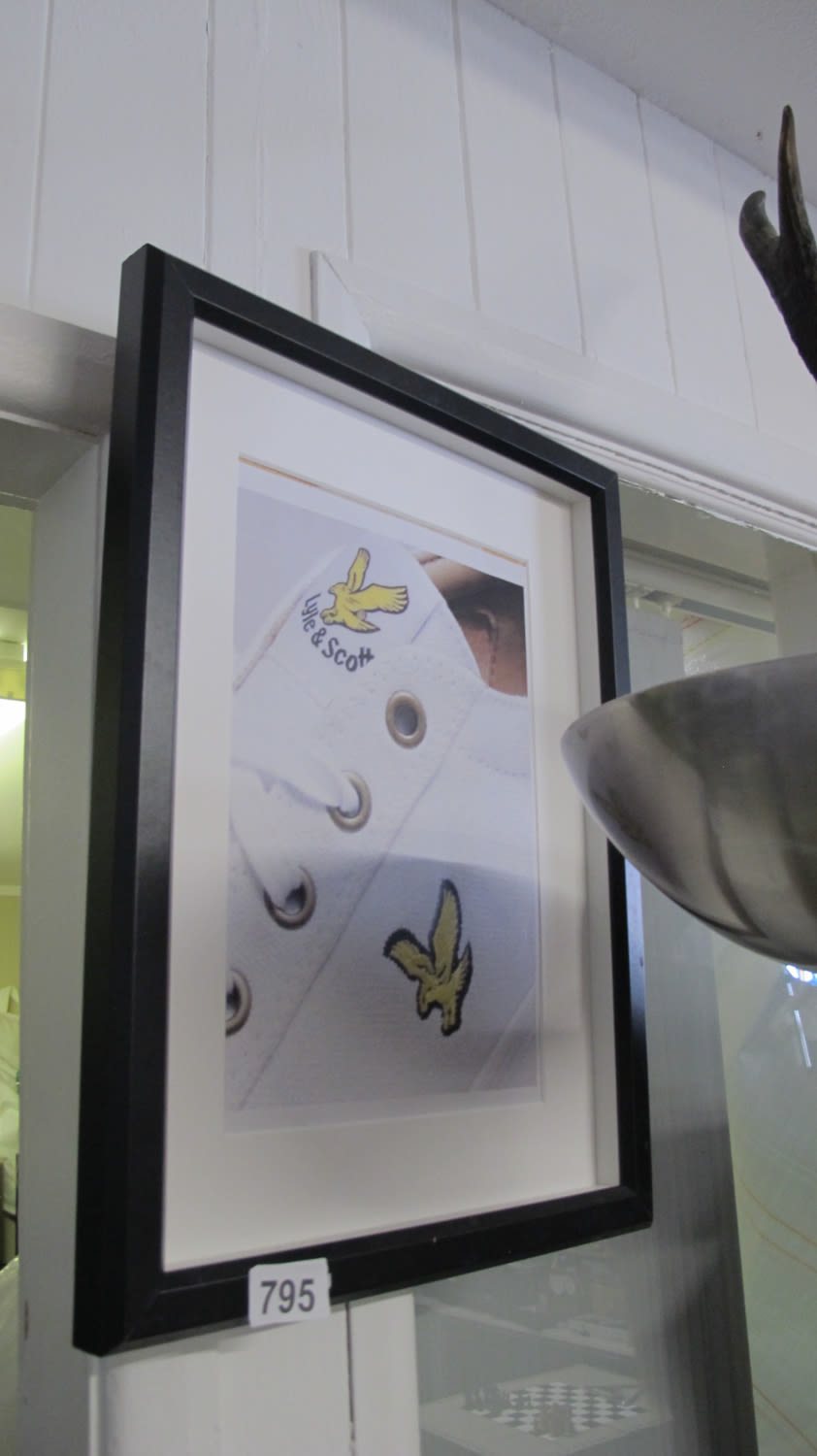 Lot 795: Framed and glazed Lyle and Scott picture
