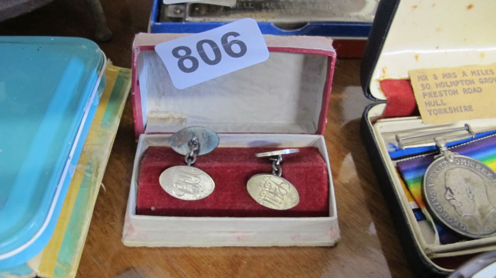 Lot 806: silver cufflinks