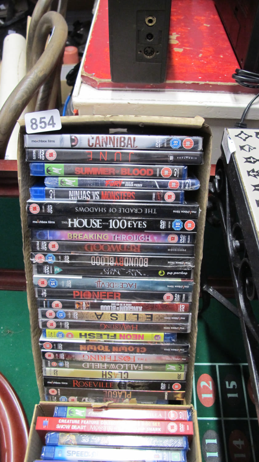 Lot 854: Box of new DVD's