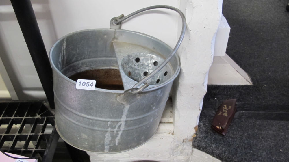 Lot 1054: galvanized mop bucket