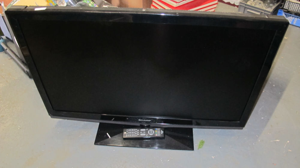 Lot 1056: Sharp TV