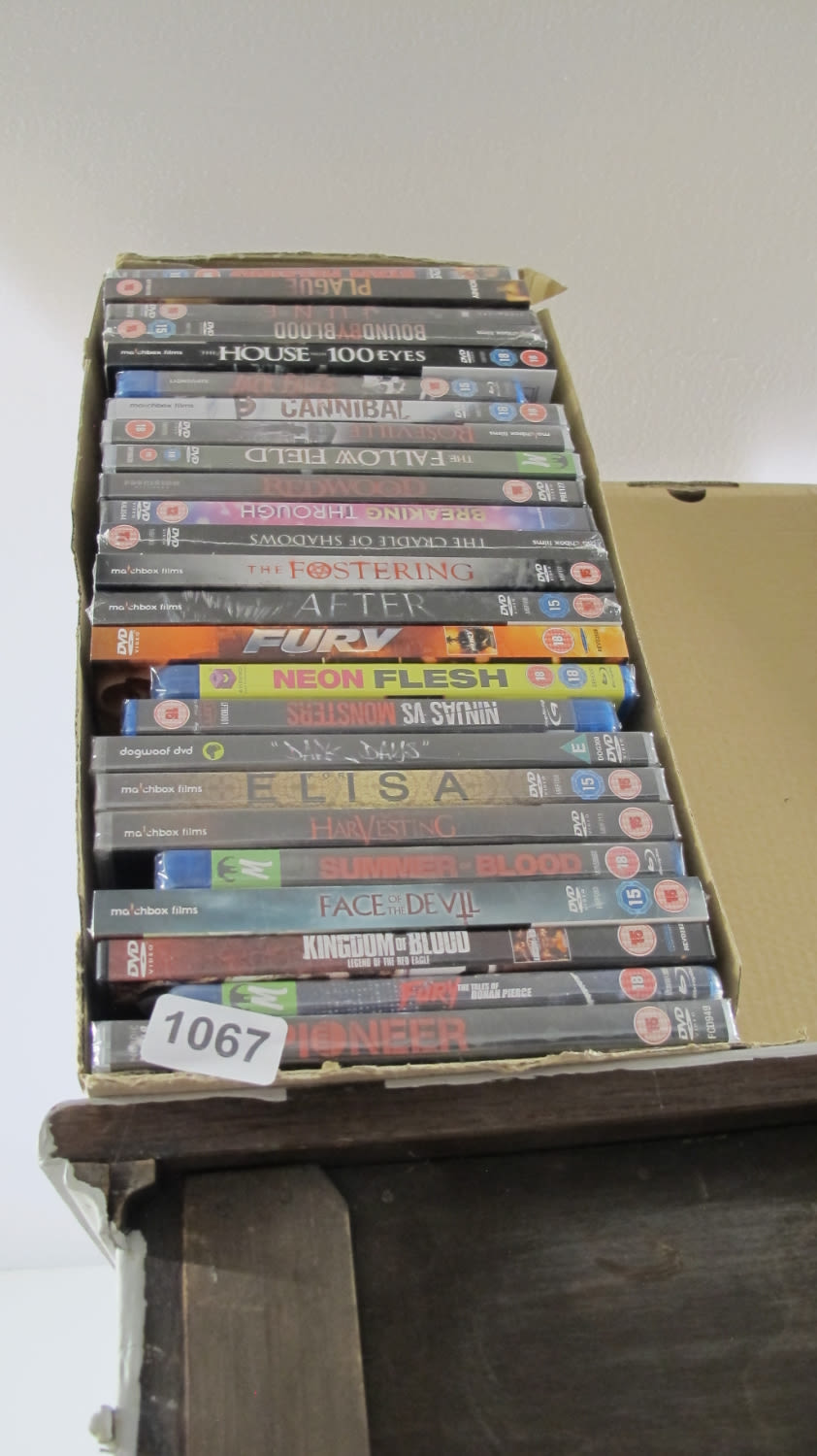 Lot 1067: Box of new DVDs
