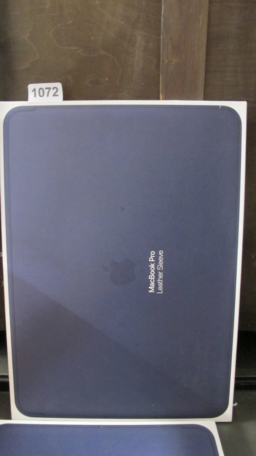 Lot 1072: Macbook pro leather sleeve