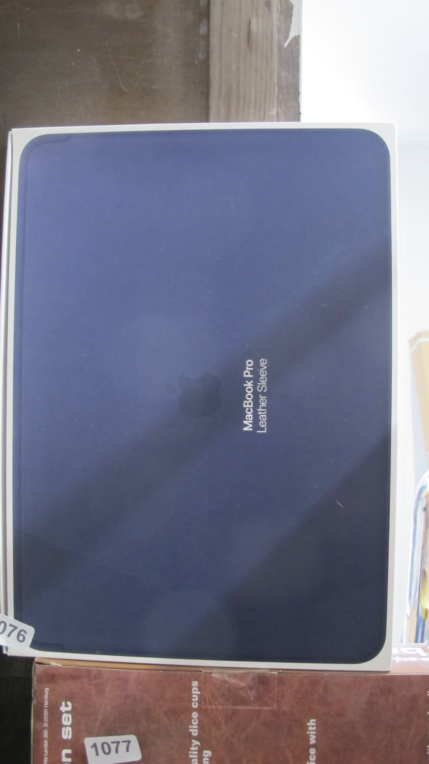 Lot 1076: Macbook pro leather sleeve