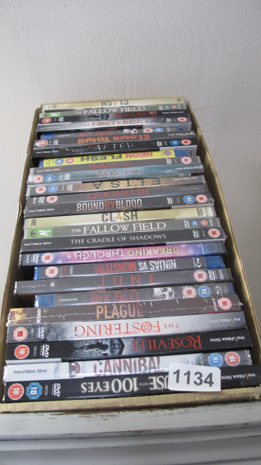 Lot 1134: Box of new DVD's