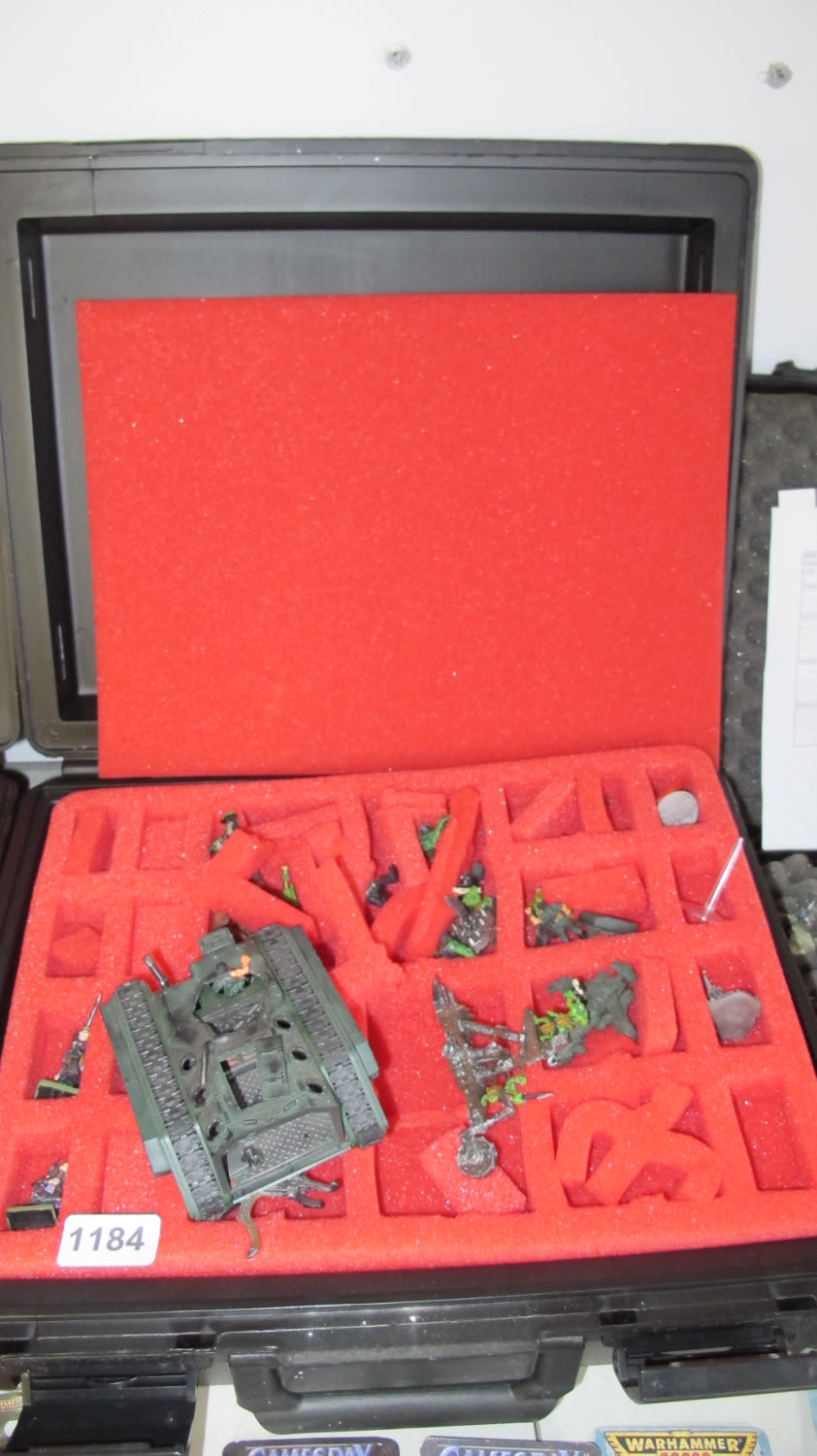 Lot 1184: Assorted Warhammer figurines with storage case