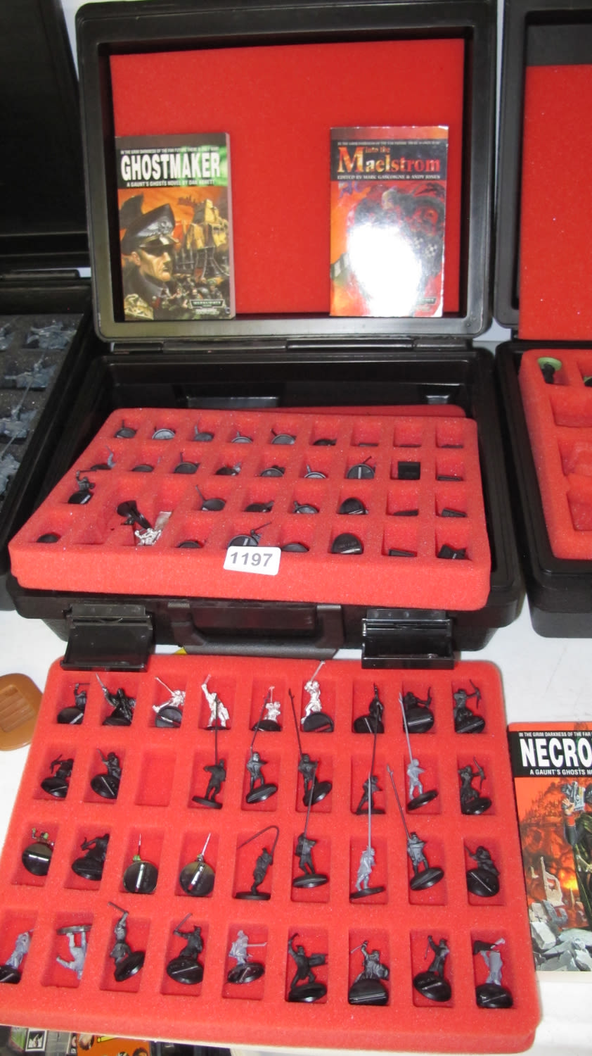 Lot 1197: Large quantity of Warhammer figurines and storage case