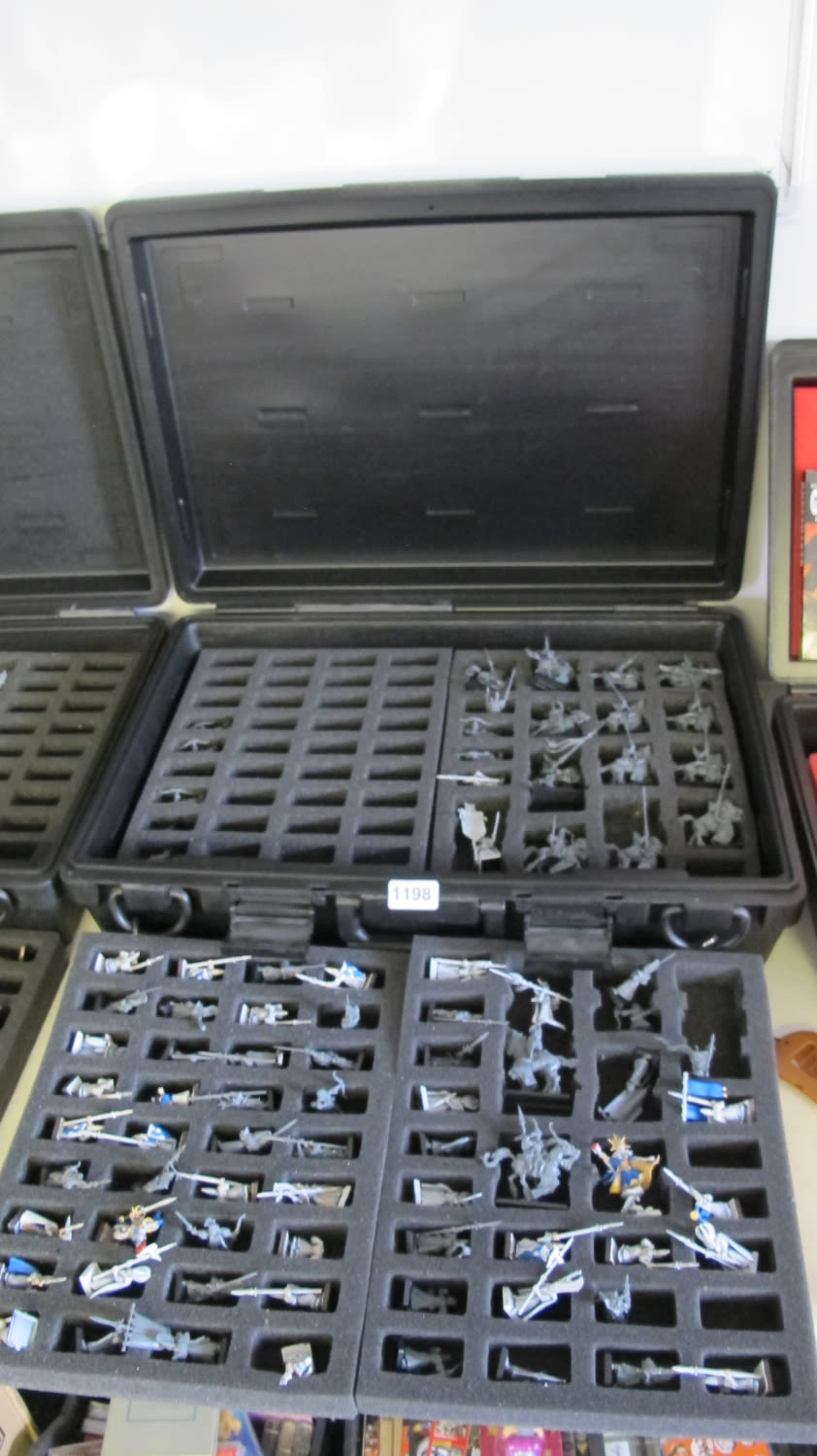 Lot 1198: Large quantity of Warhammer figurines and storage case