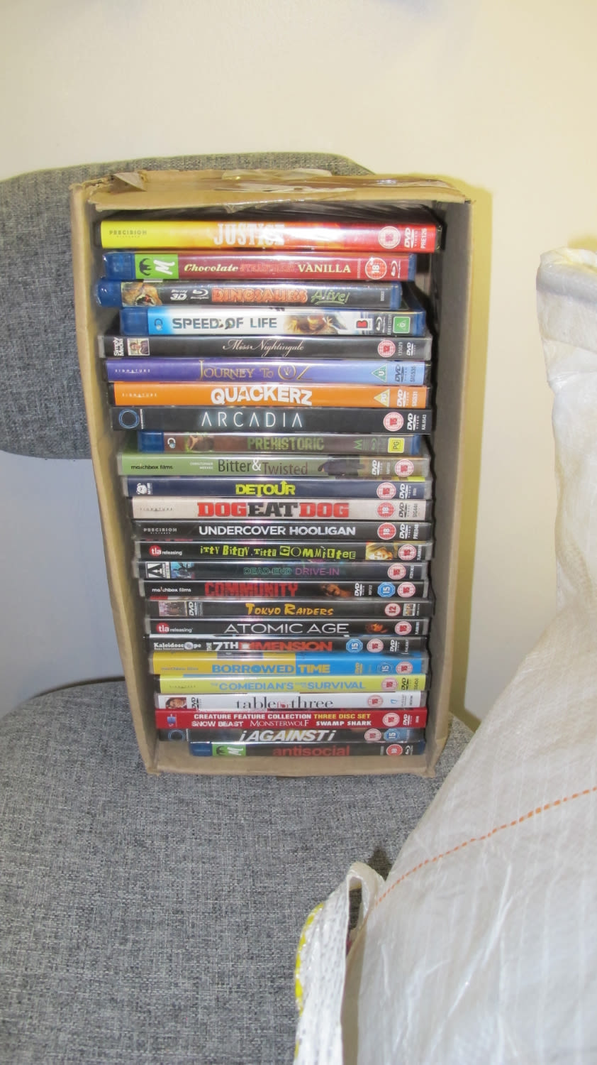 Lot 1236: Box of new DVDs