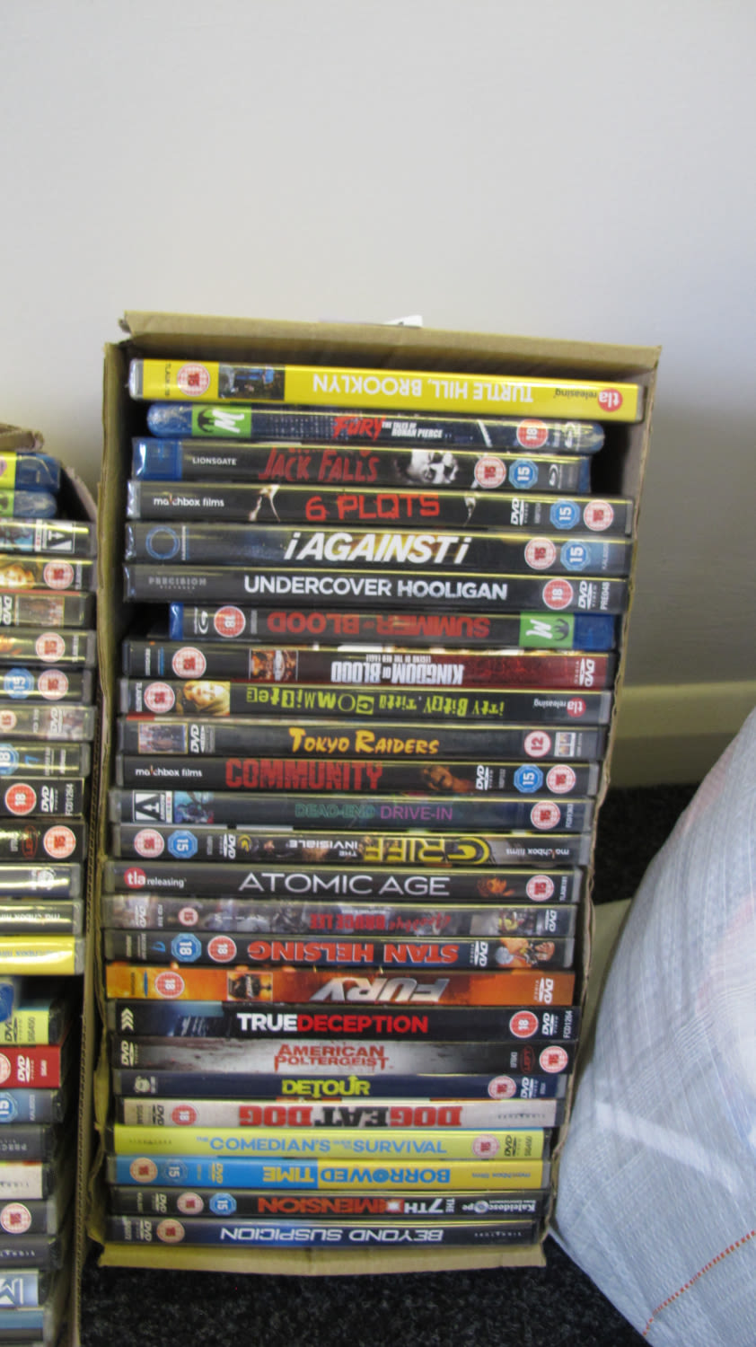 Lot 1251: Box of new DVDs