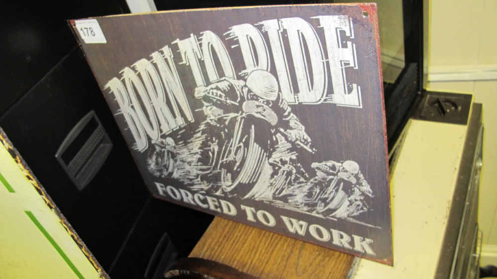 Lot 178: Born to ride metal sign