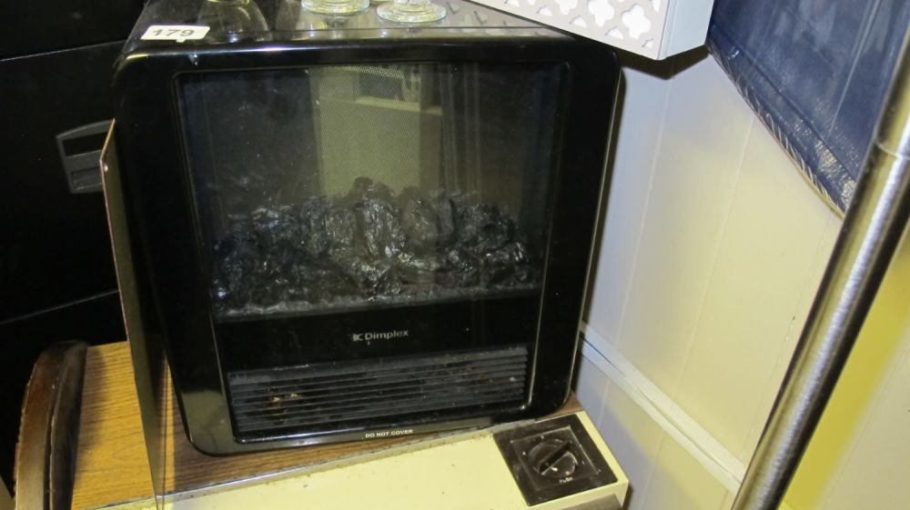 Lot 179: Electric fire effect heater
