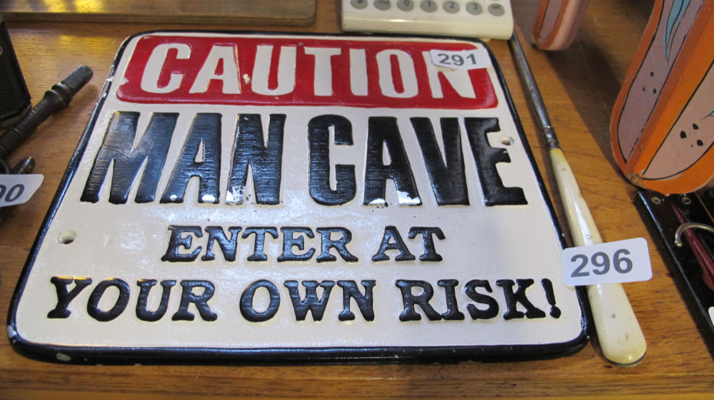 Lot 291: Man Cave cast metal sign