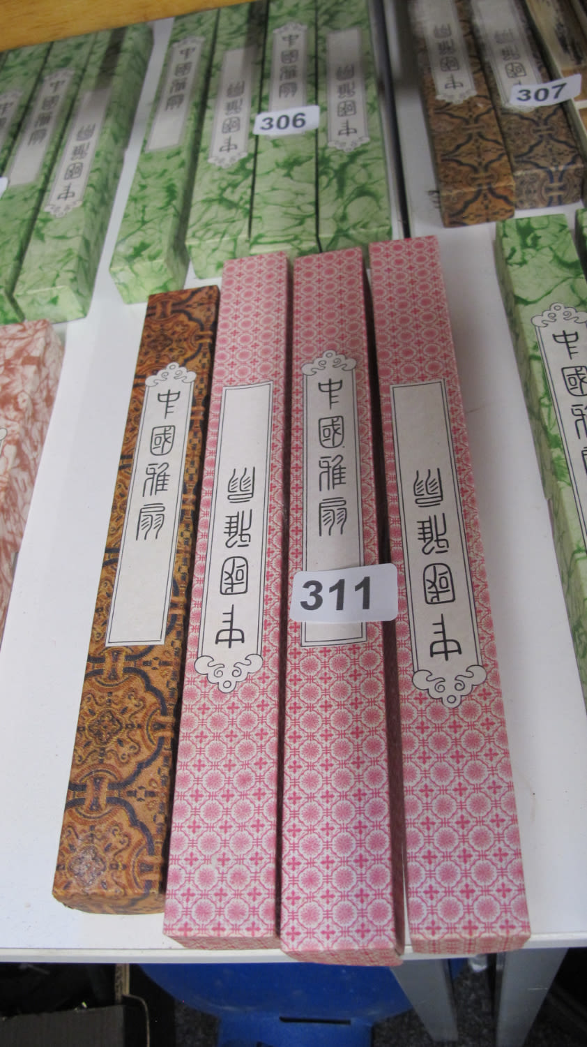 Lot 311: Boxed Chinese fans hand carved and ink painted