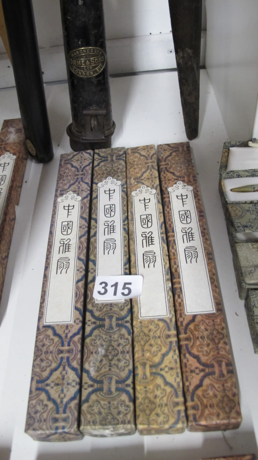 Lot 315: Boxed Chinese fans hand carved and ink painted