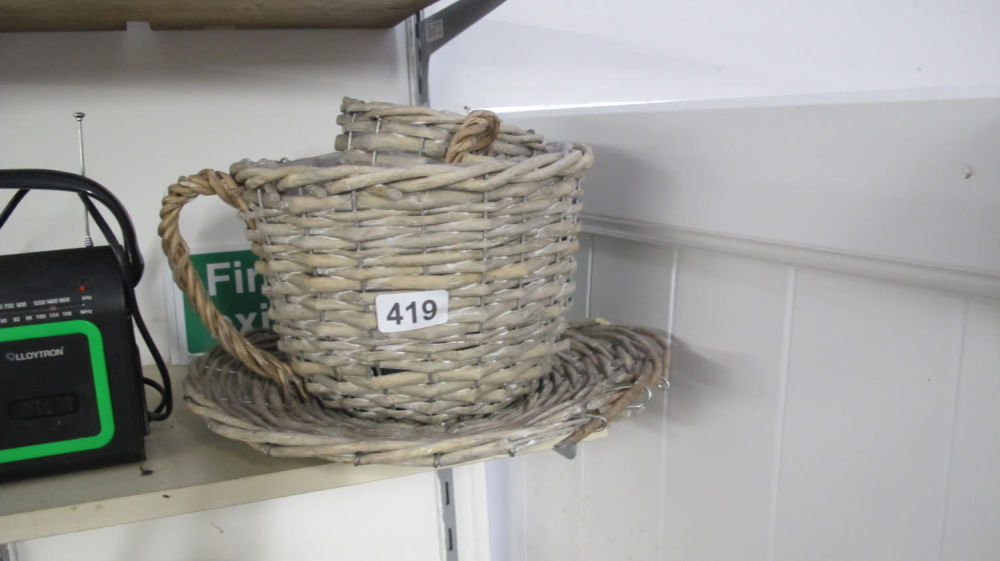 Lot 419: Wicker plant pot x 3
