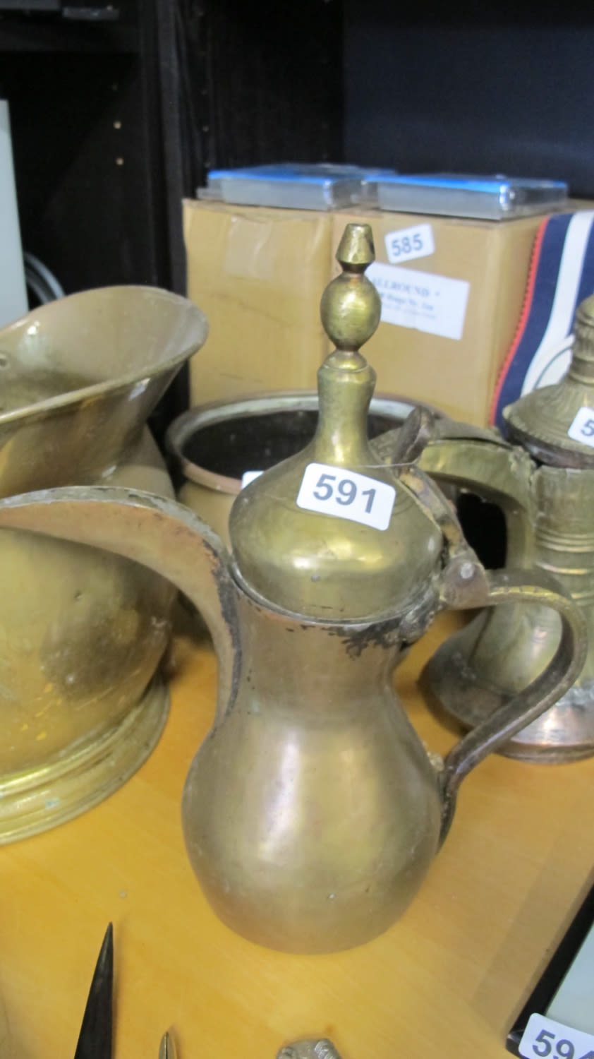 Lot 591: Moroccan brass jug
