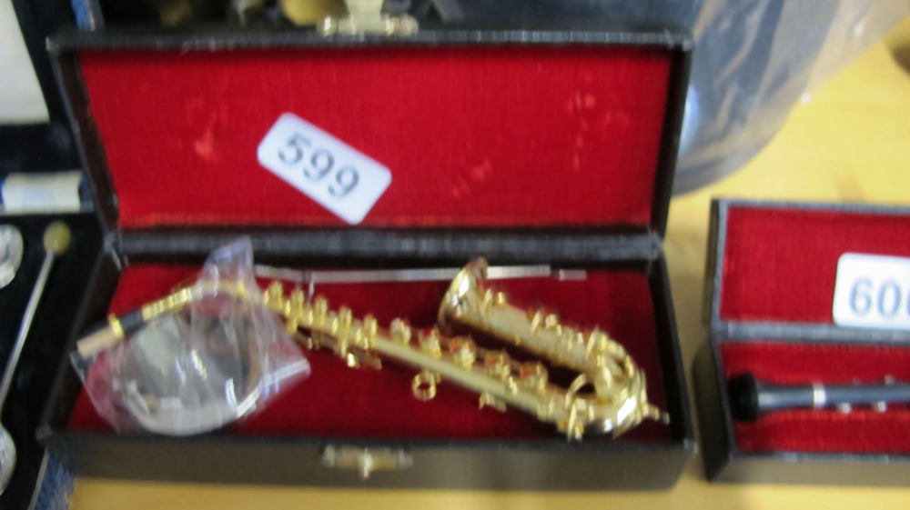 Lot 599: Miniature saxophone