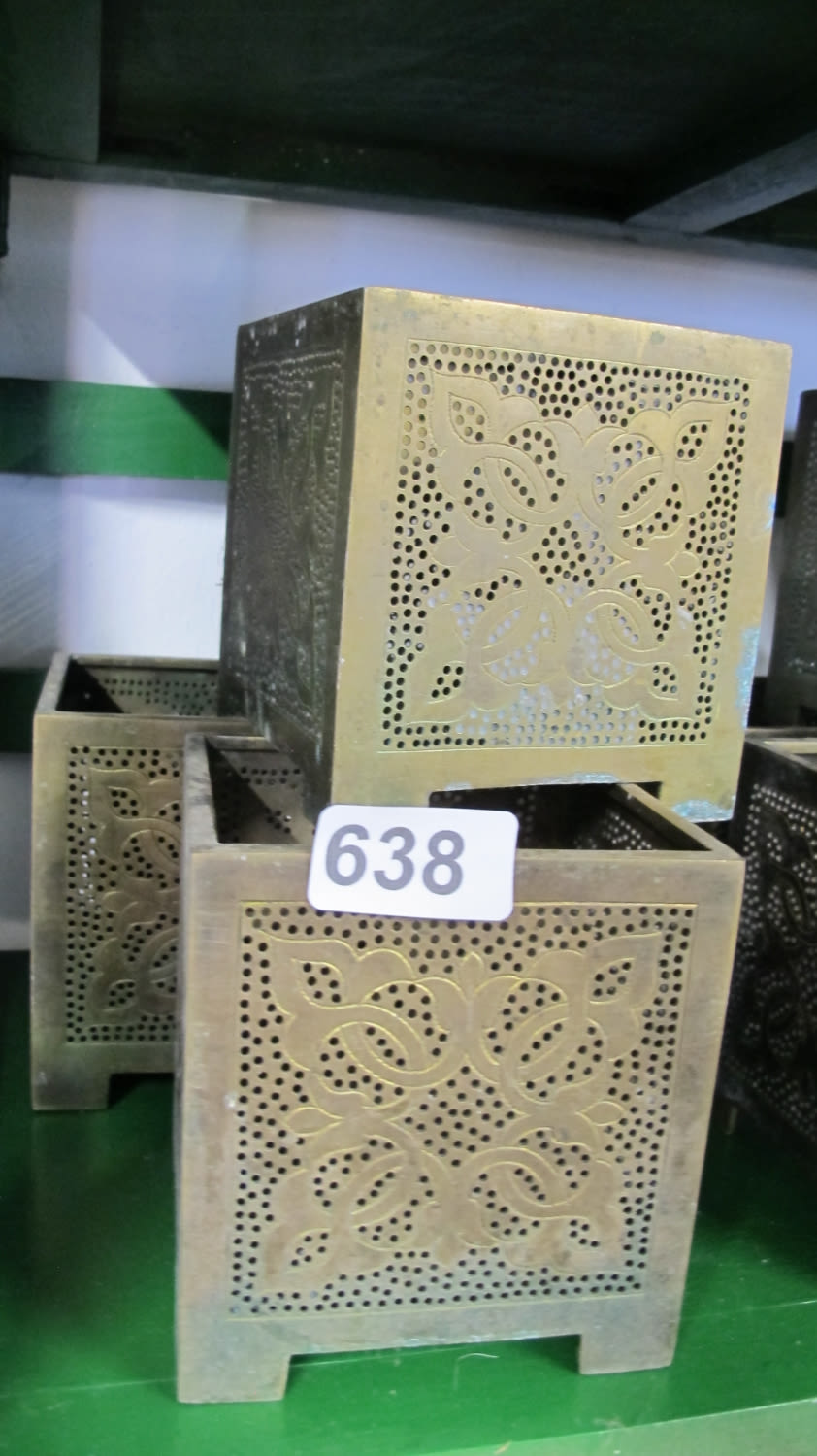 Lot 638: pierced Moroccan candle lanterns