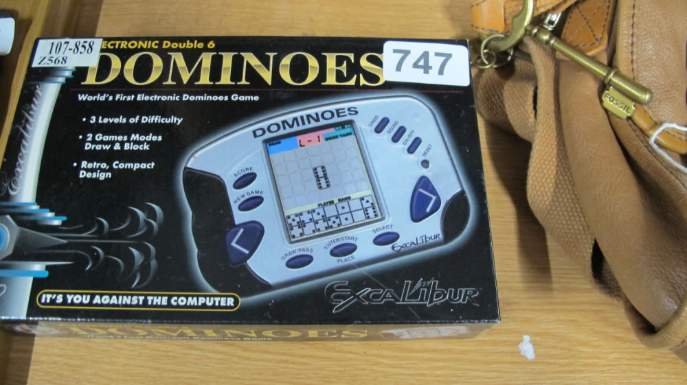 Lot 747: dominoes hand held game