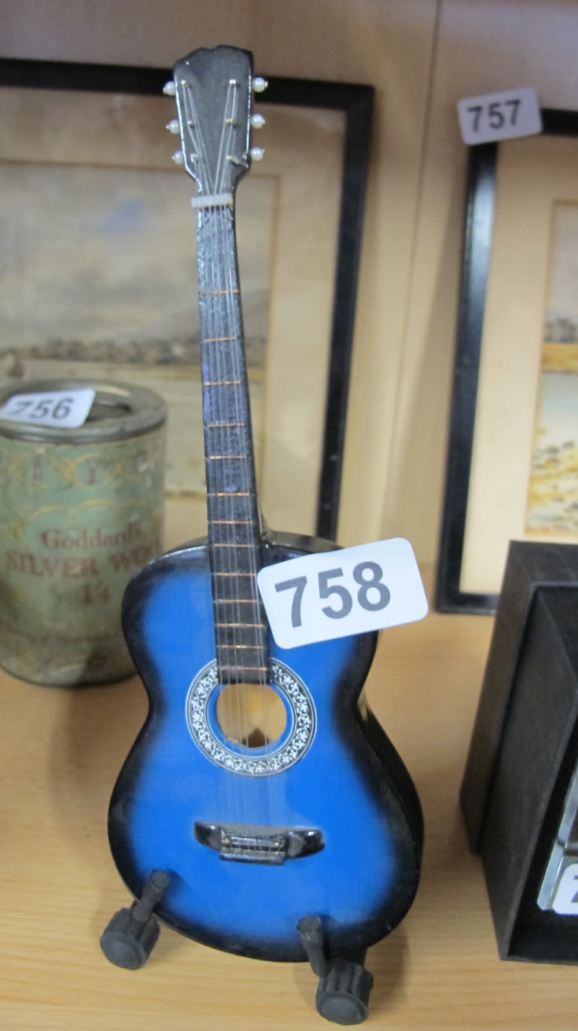 Lot 758: miniature guitar