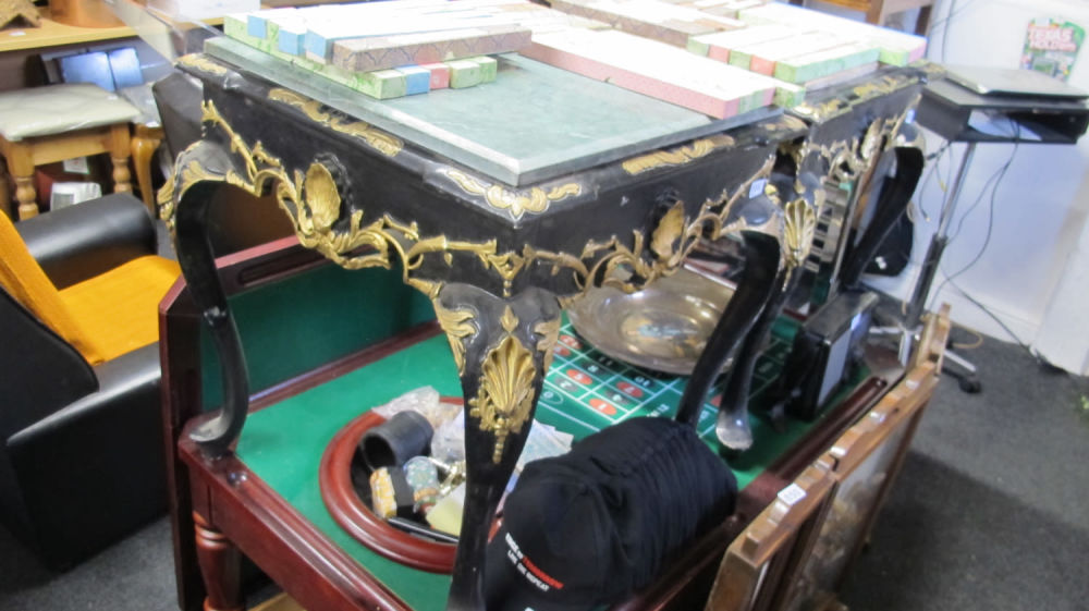 Lot 844: gilt and ebonised marble top table