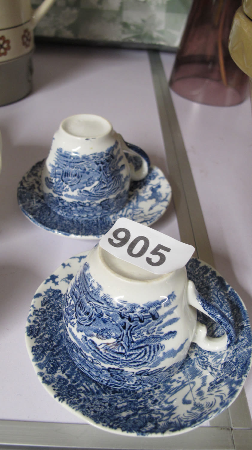 Lot 905: 2 blue and white cups and saucers