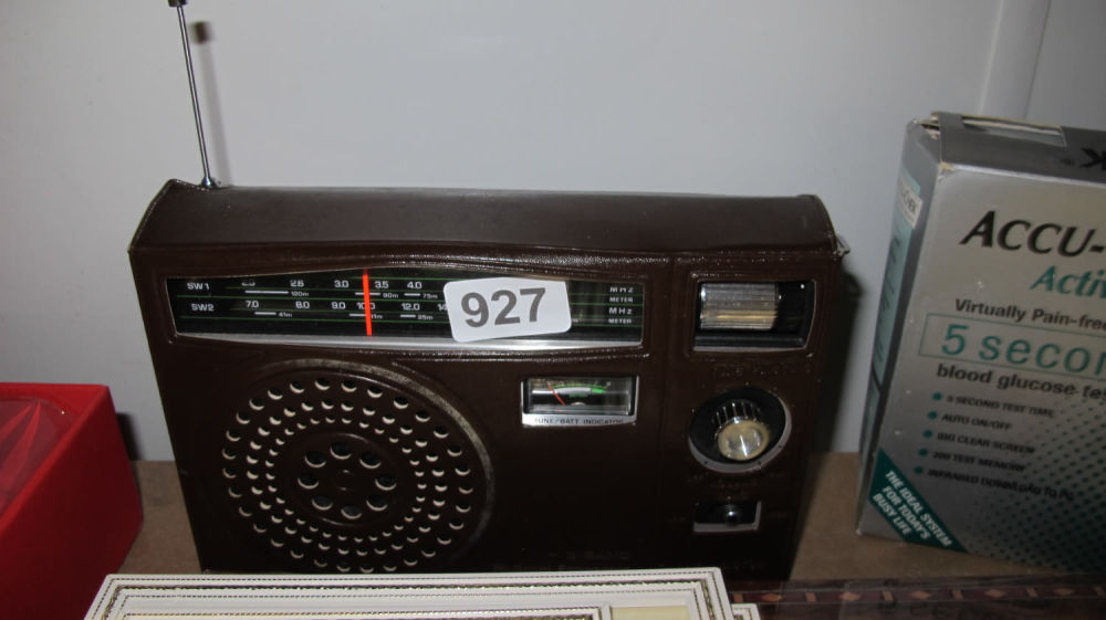 Lot 927: Vintage leather clad radio